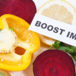 Inscription boost immunity, fresh ripe healthy fruits and vegetables
