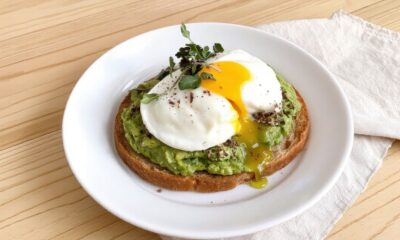 whole grain avocado toast with poached egg featured
