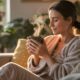 woman enjoying a cup of bone broth